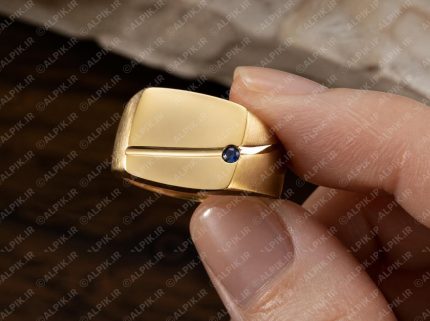 انگشتر طلای مردانه با نگین یاقوت کبود